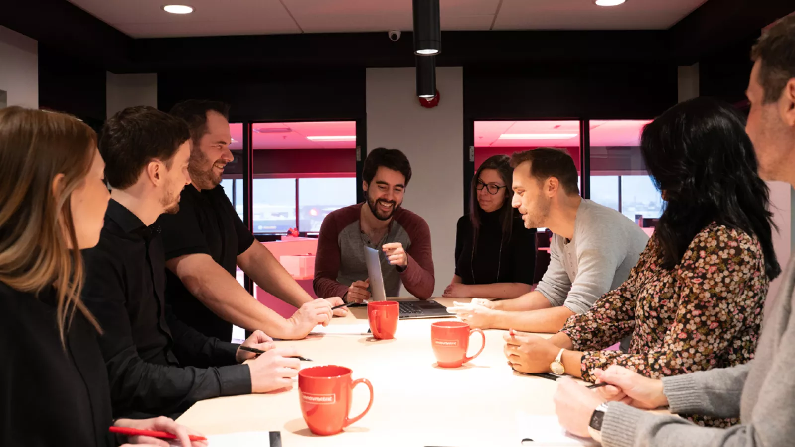 InnovMetric employees discussing at head office in Quebec City, Canada. 